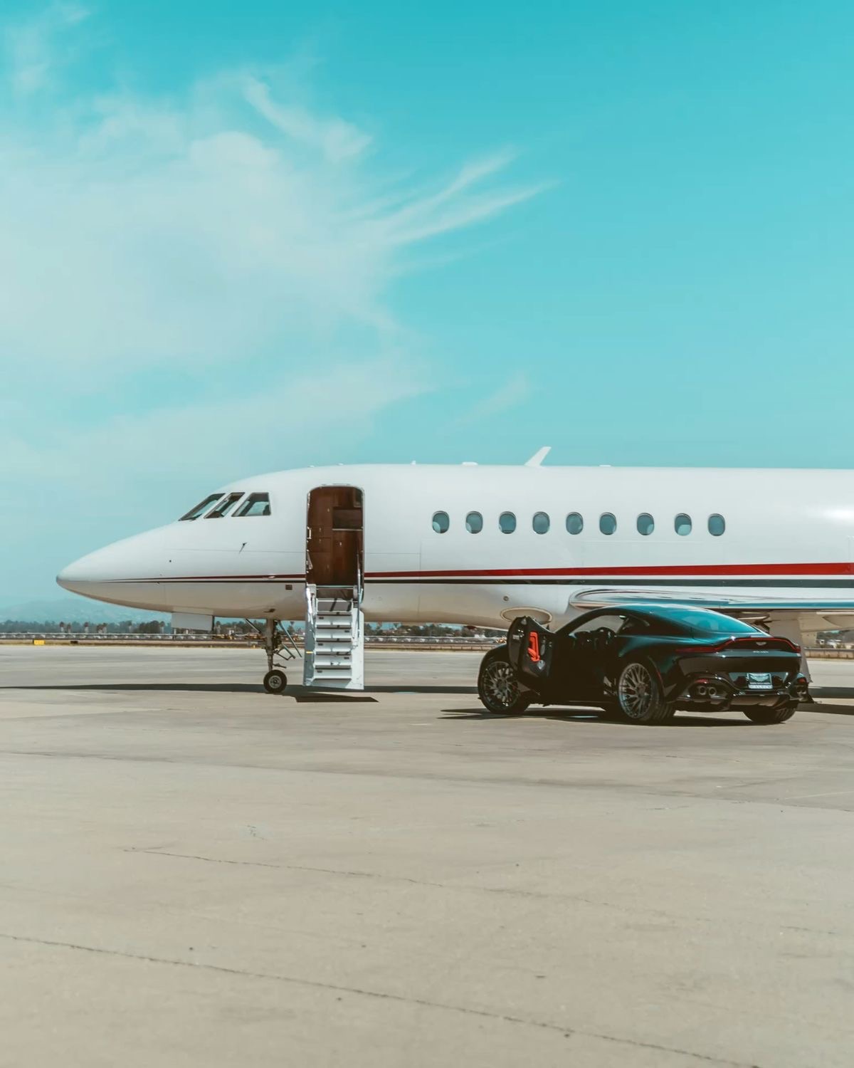 Private luxury jet at airport terminal